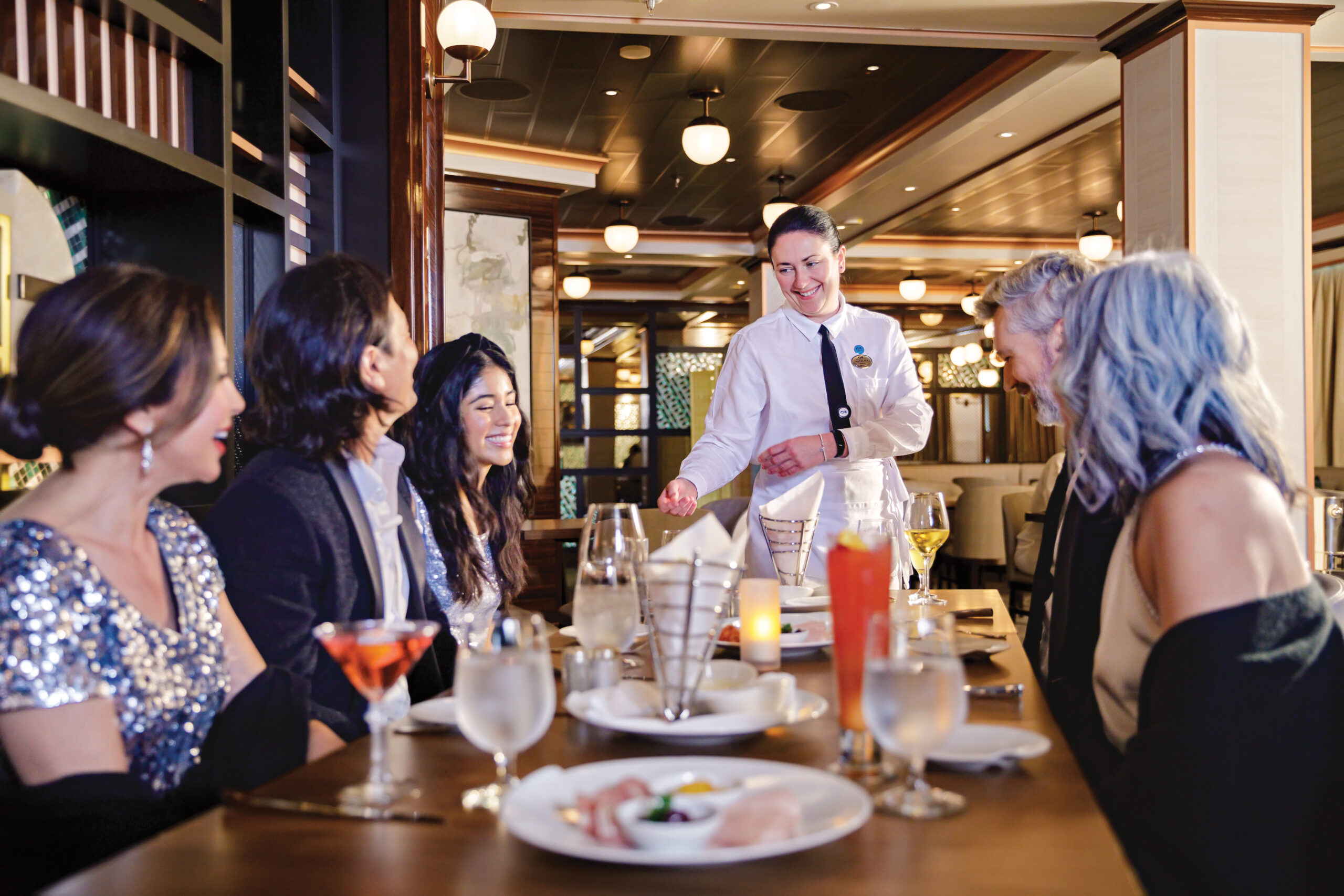 Elegant dining setup at Sabatini's Italian Trattoria on Discovery Princess cruise ship.